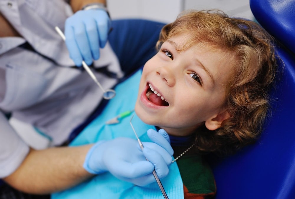 Preventive Dentistry: Child receiving a dental exam at Rockville Smiles in Rocklin, California